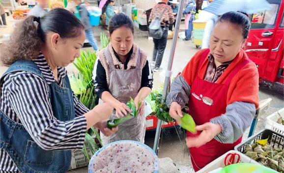 習水：“端午經(jīng)濟”紅紅火火 消費市場(chǎng)“節味”十足